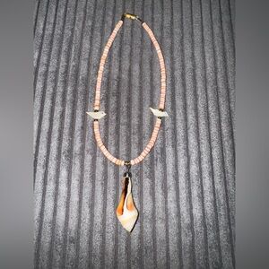 Elegant Beaded Necklace with Bird Accents with matching earrings.